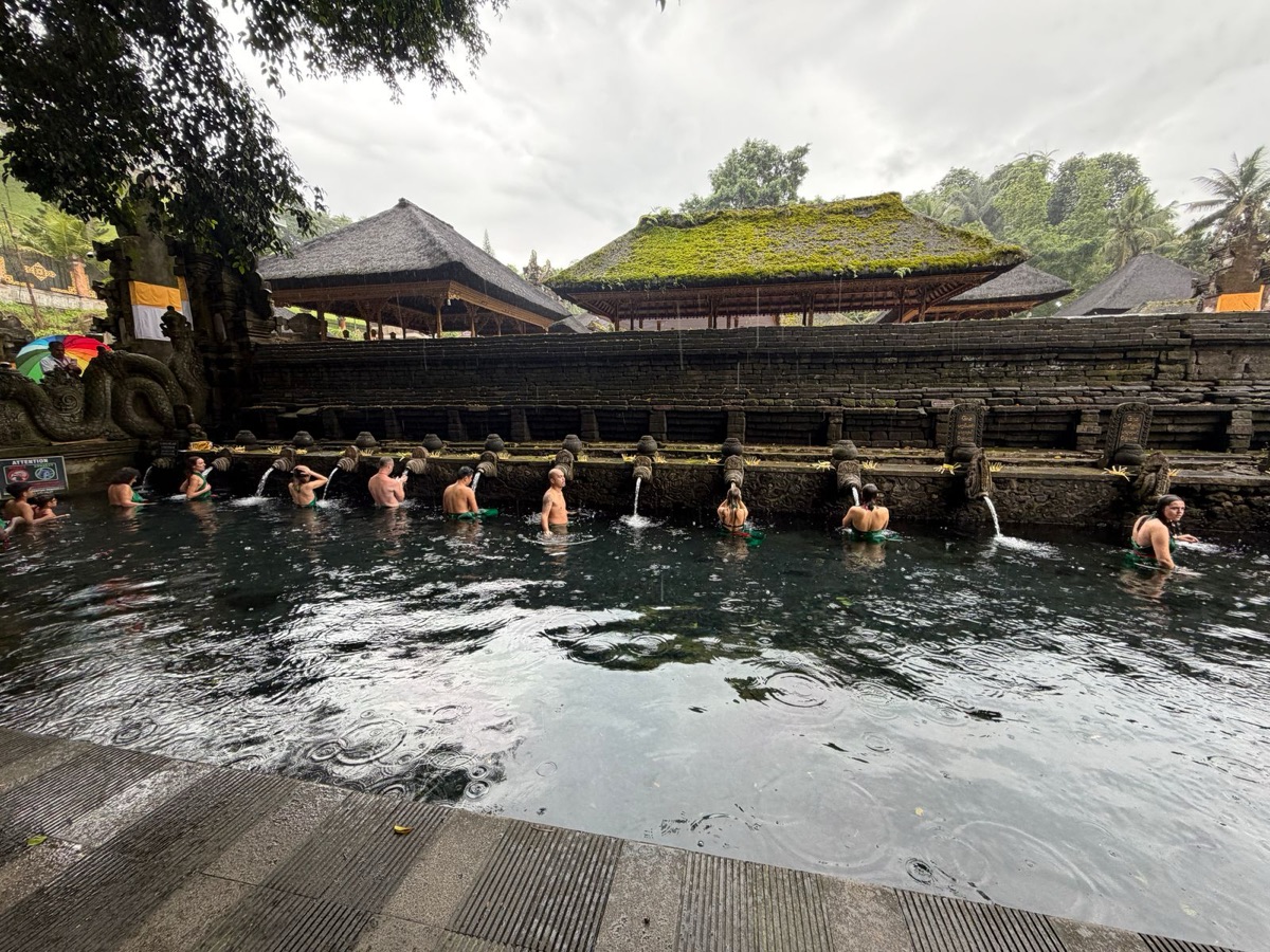 Bathing ritual at Tirta Empul Temple, Bali.